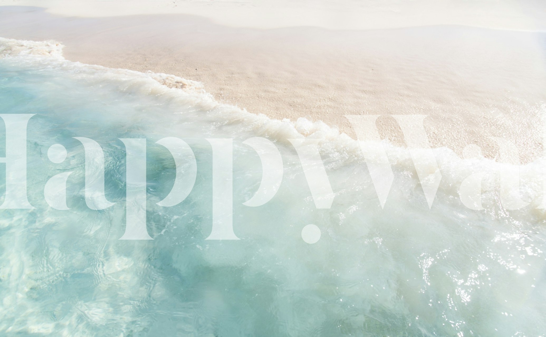 Ocean wave meeting the sandy beach in soft pastel colors wallpaper