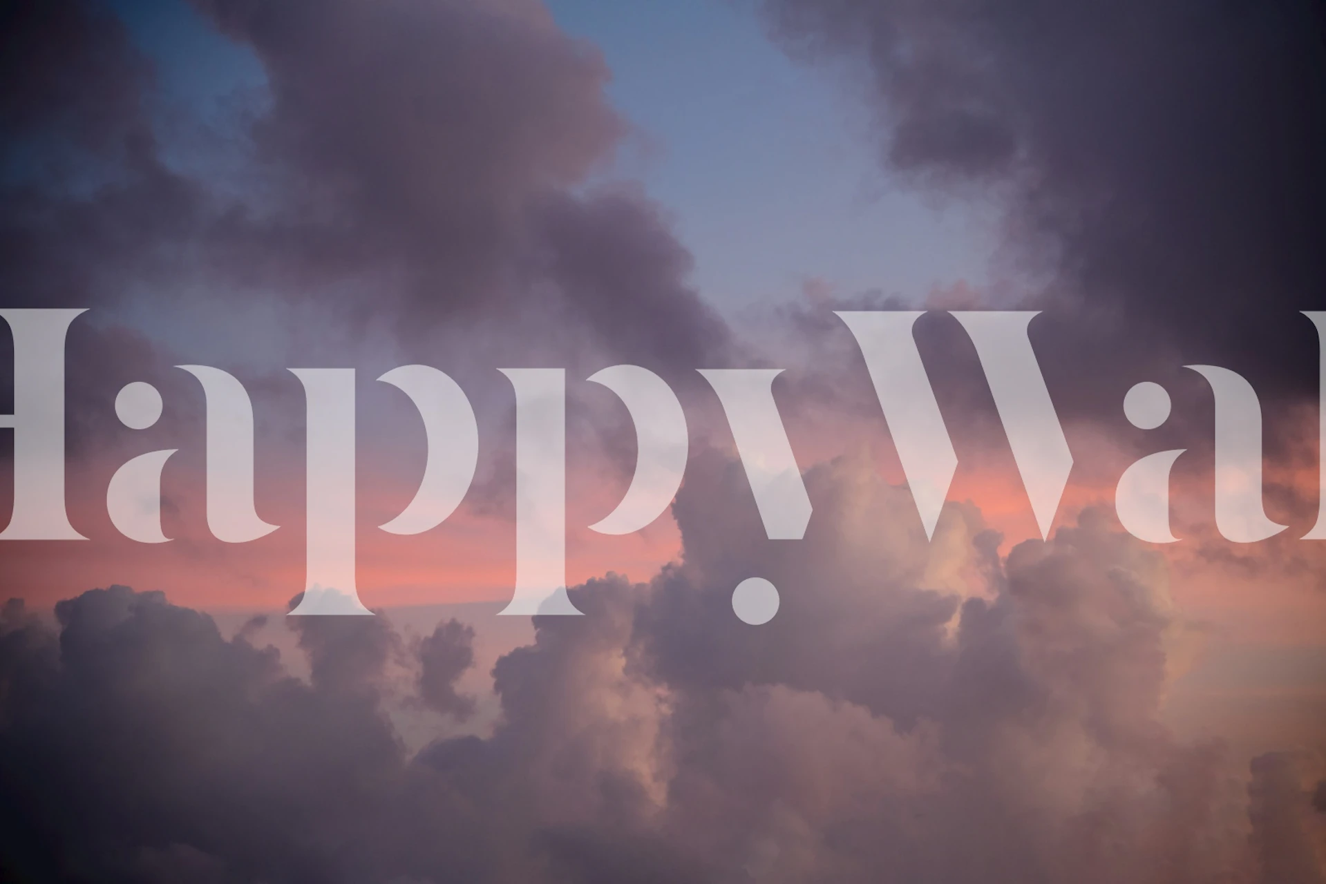 Colorful sunset clouds in shades of purple and pink wallpaper