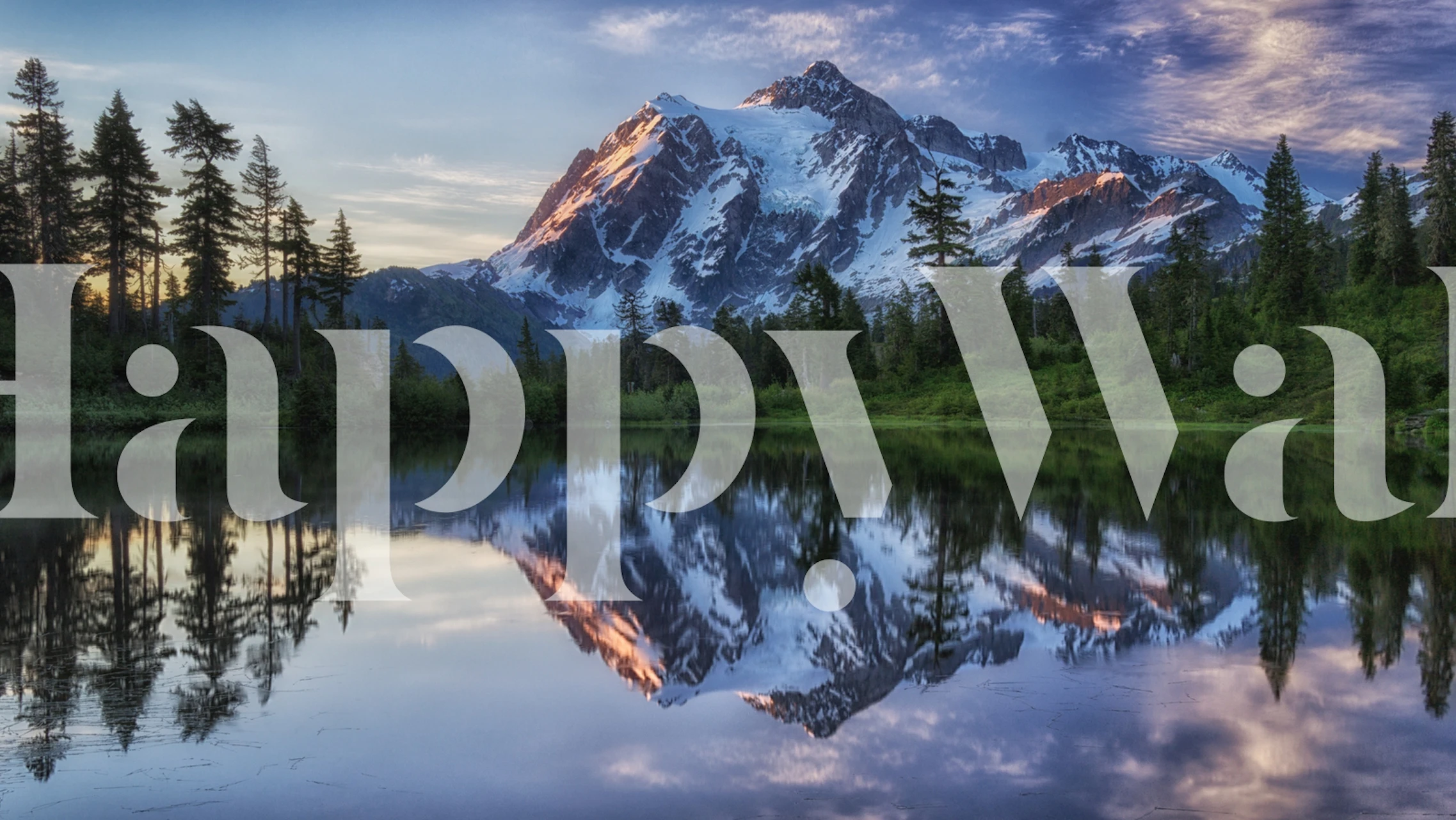 Fotobehang van de dageraad die over de berg Shuksan breekt met kleurrijke lucht en reflectie op het water