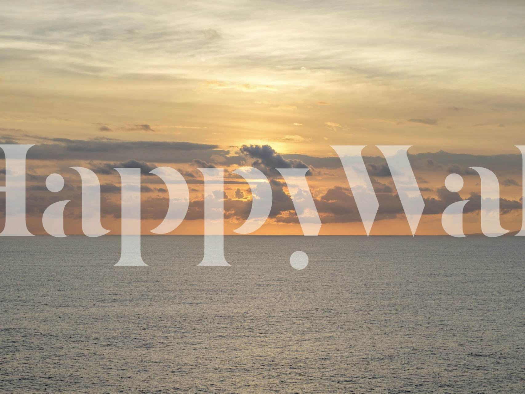 Serene ocean sunset with warm orange and blue hues wallpaper