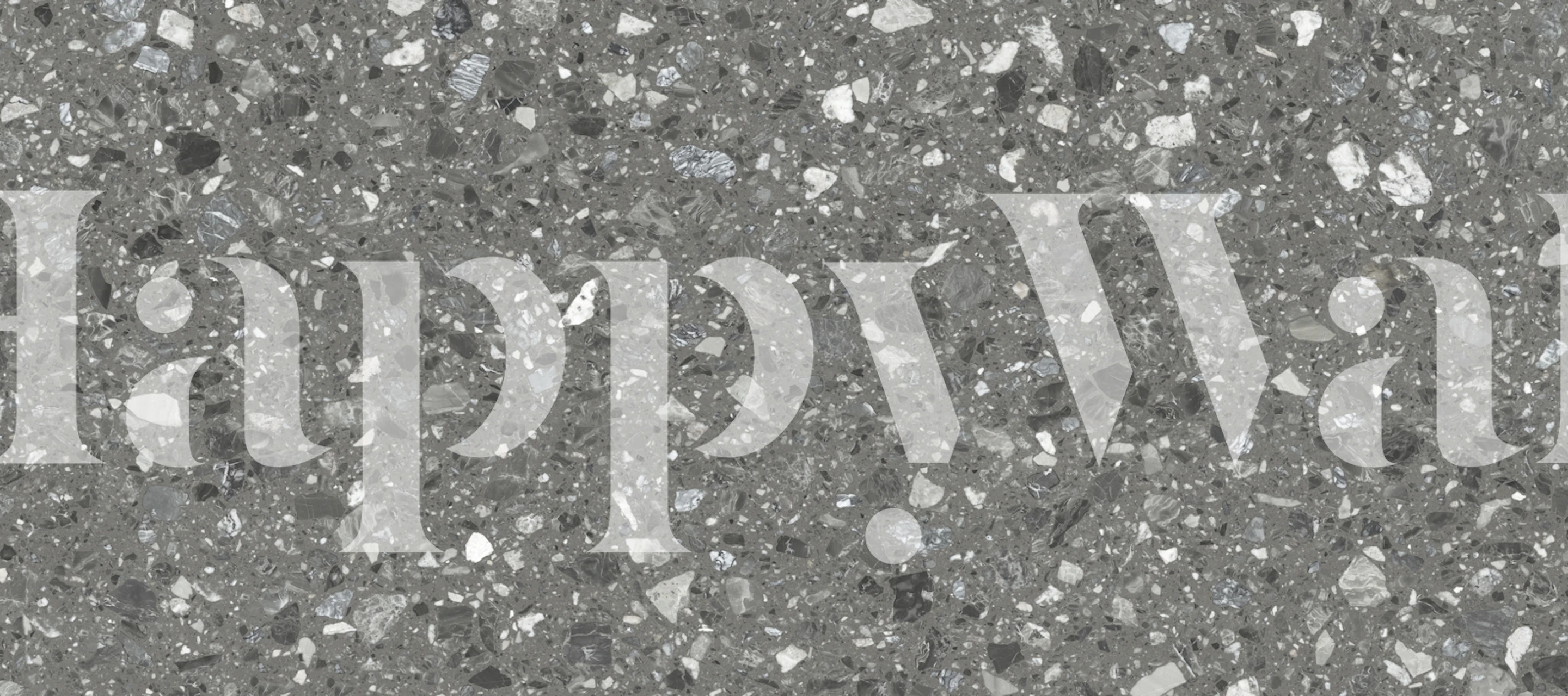 Gray textured wallpaper resembling geometric tiles