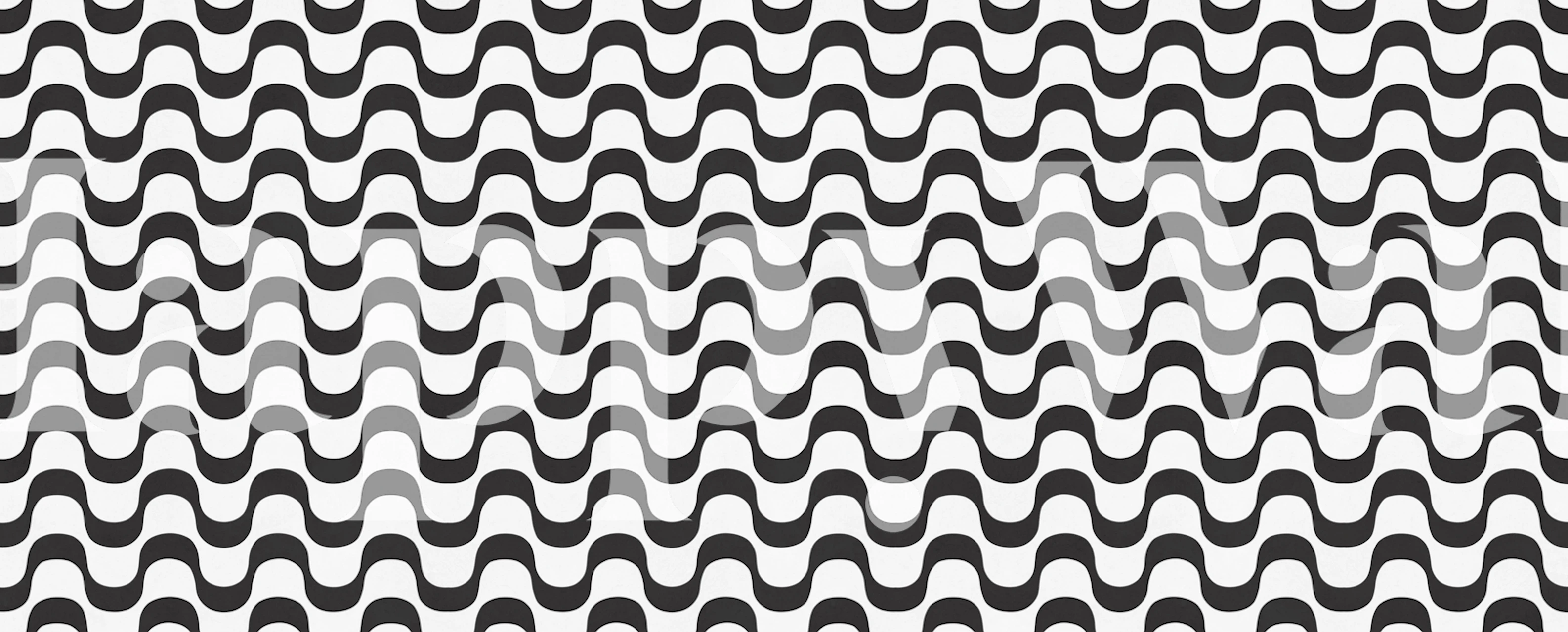 Wavy black and white patterned wallpaper in a room