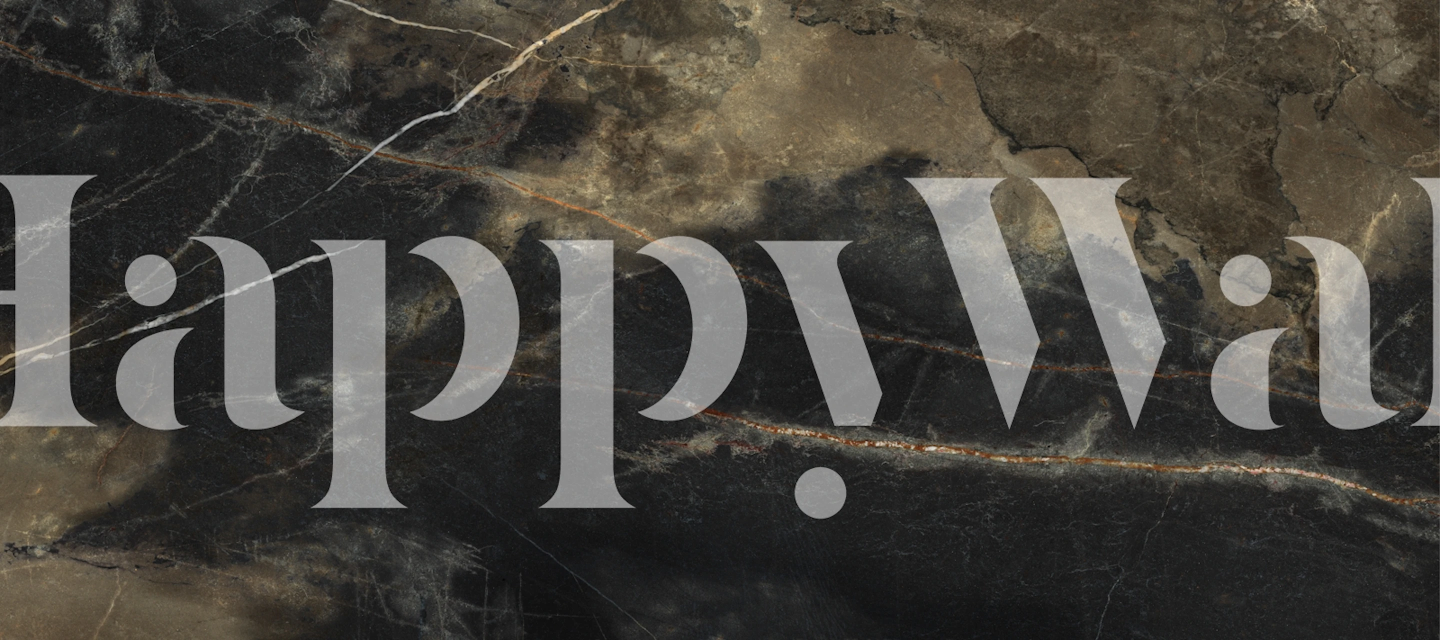 Sahara Noir Marble wallpaper displayed in a room