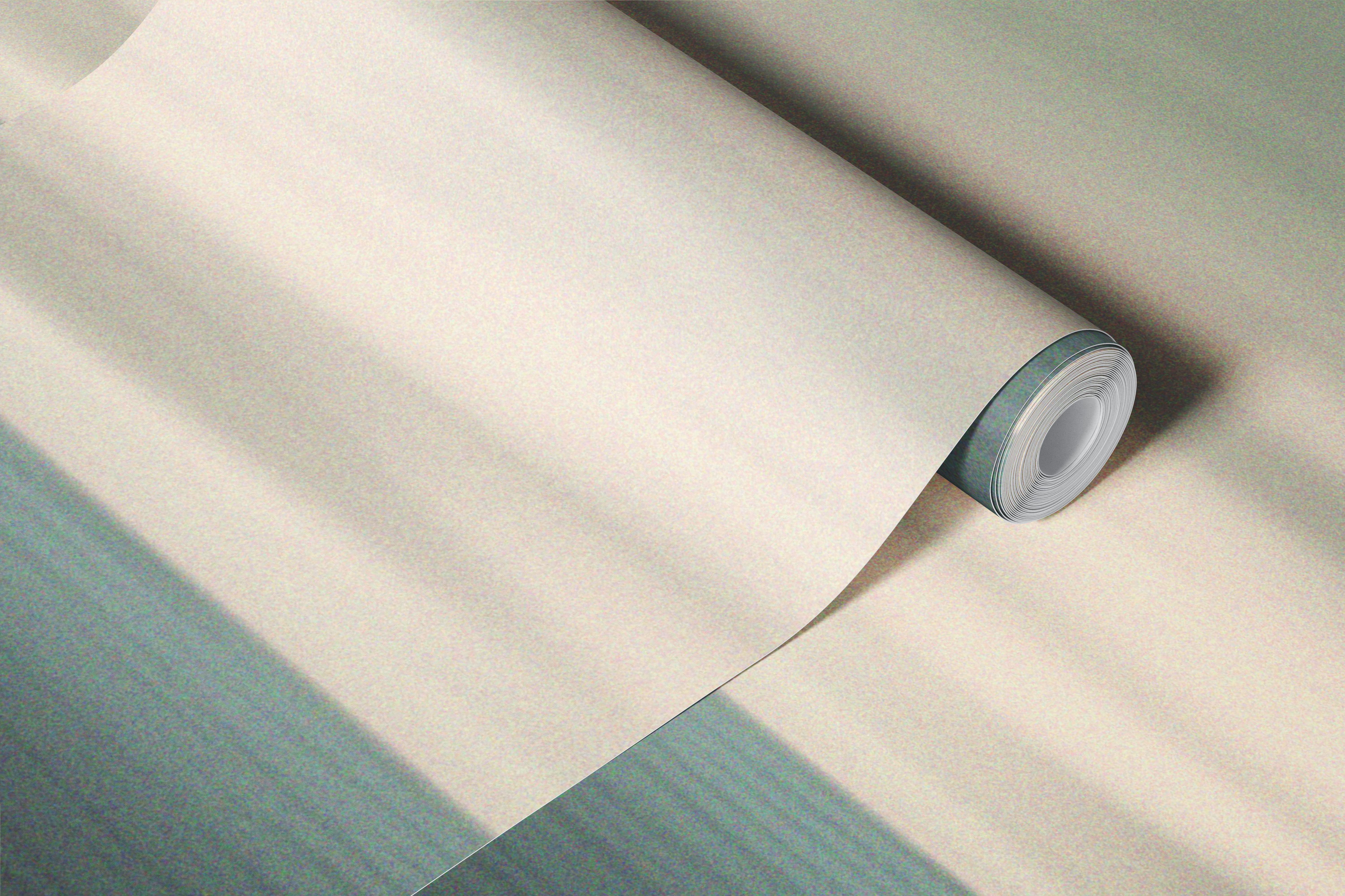 Ocean waves and soft clouds in muted tones wallpaper