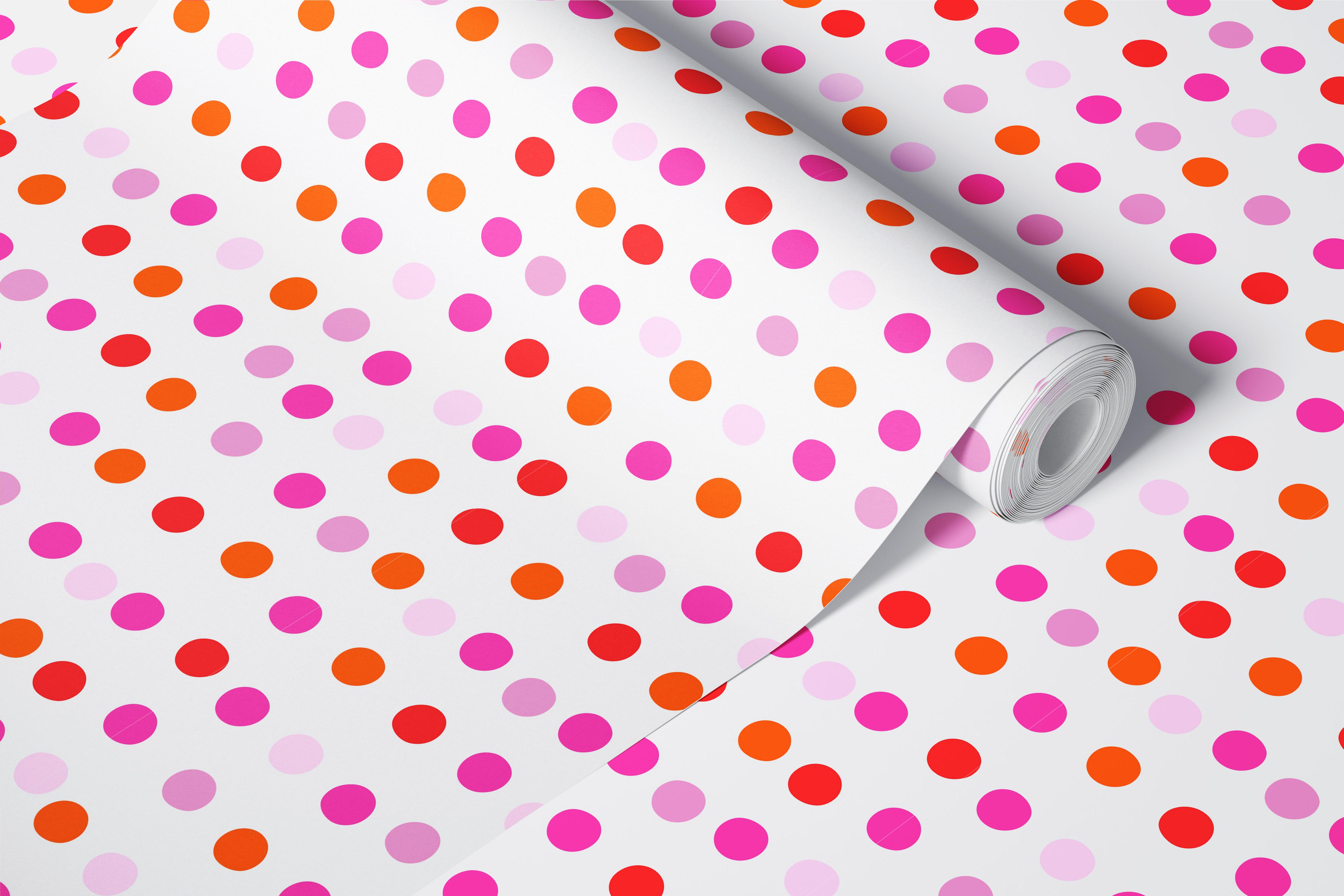 Colorful polka dot pattern wallpaper in pink, orange, and red