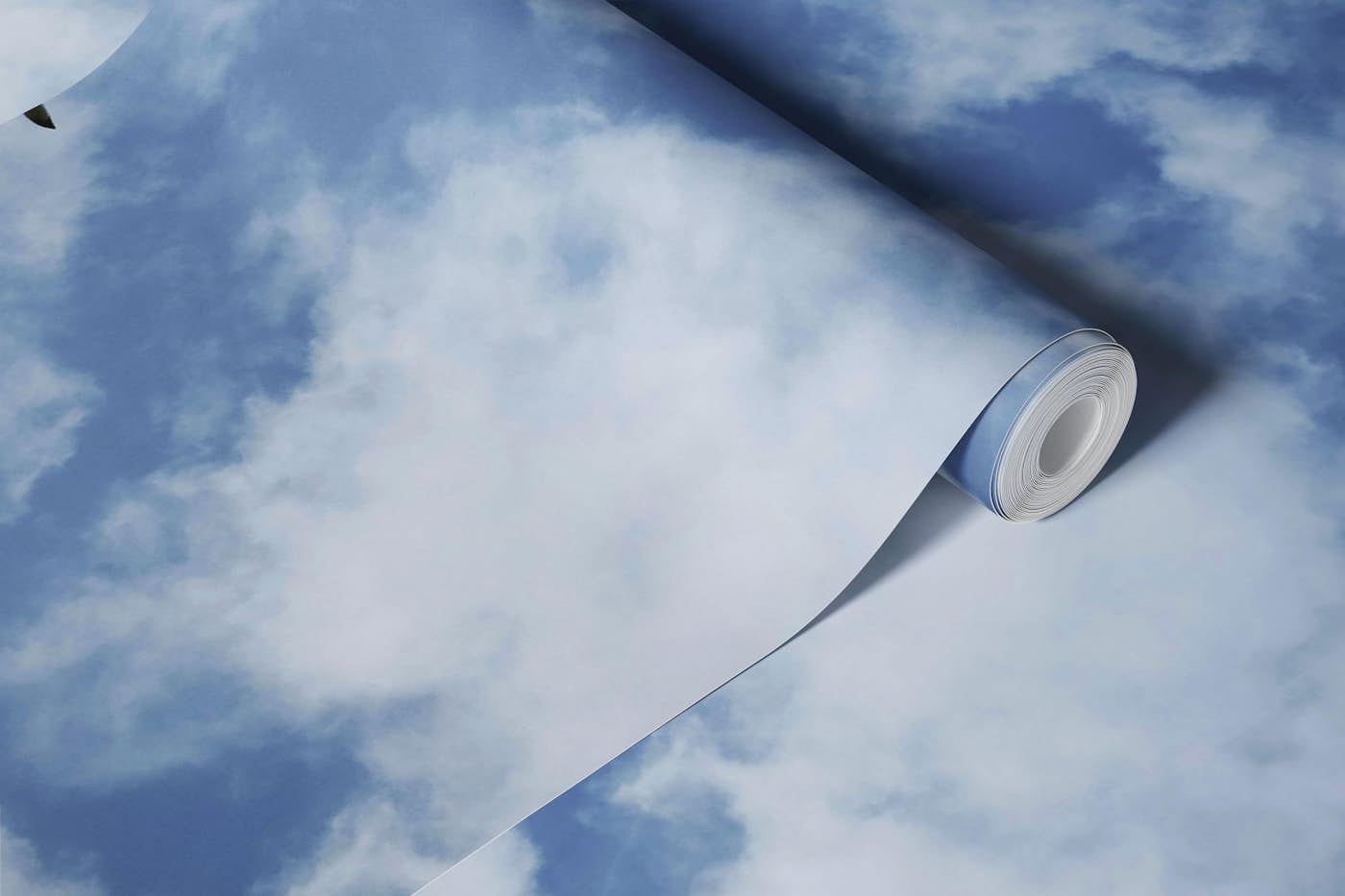 Clouds in a Blue Sky with Bird in Flight wallpaper roll