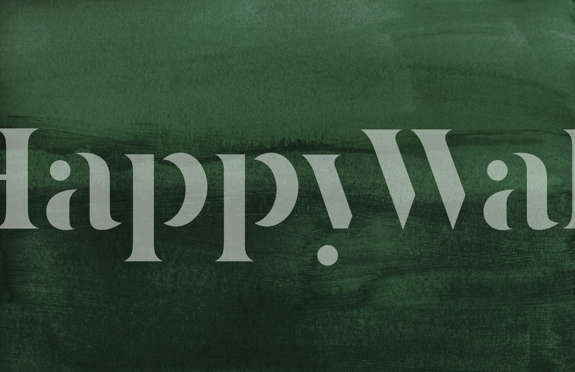 Målad gradient grön tapet i ett rum