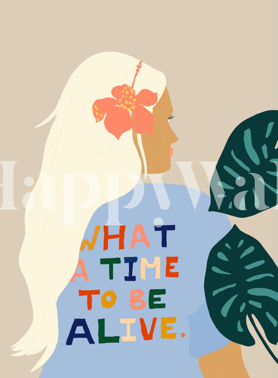 A stylish woman with long hair and a flower in her hair, wearing a blue shirt with colorful text, surrounded by tropical leaves wallpaper