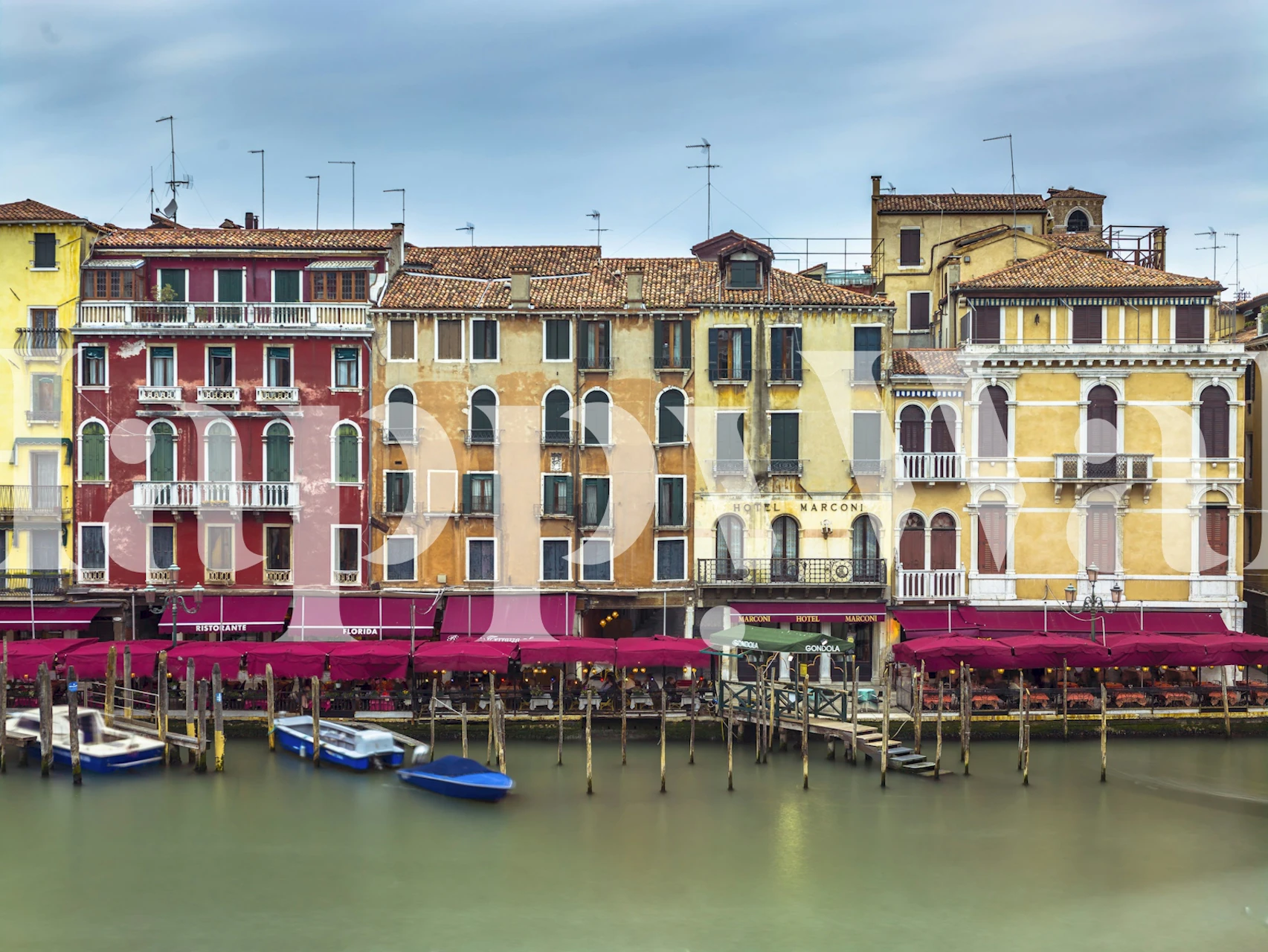 Venice facades in vibrant colors yellow, red, and blue wallpaper