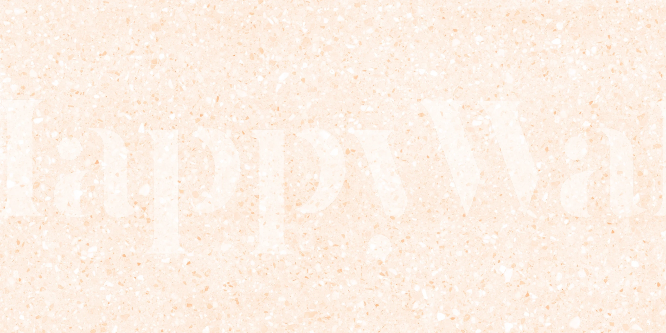 Soft beige terrazzo wallpaper with speckled patterns.