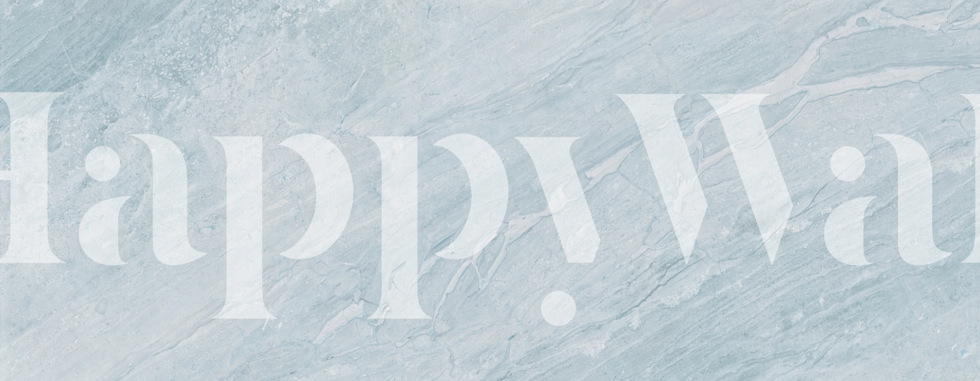 Papel pintado Ice Blue Travertine expuesto en una habitación