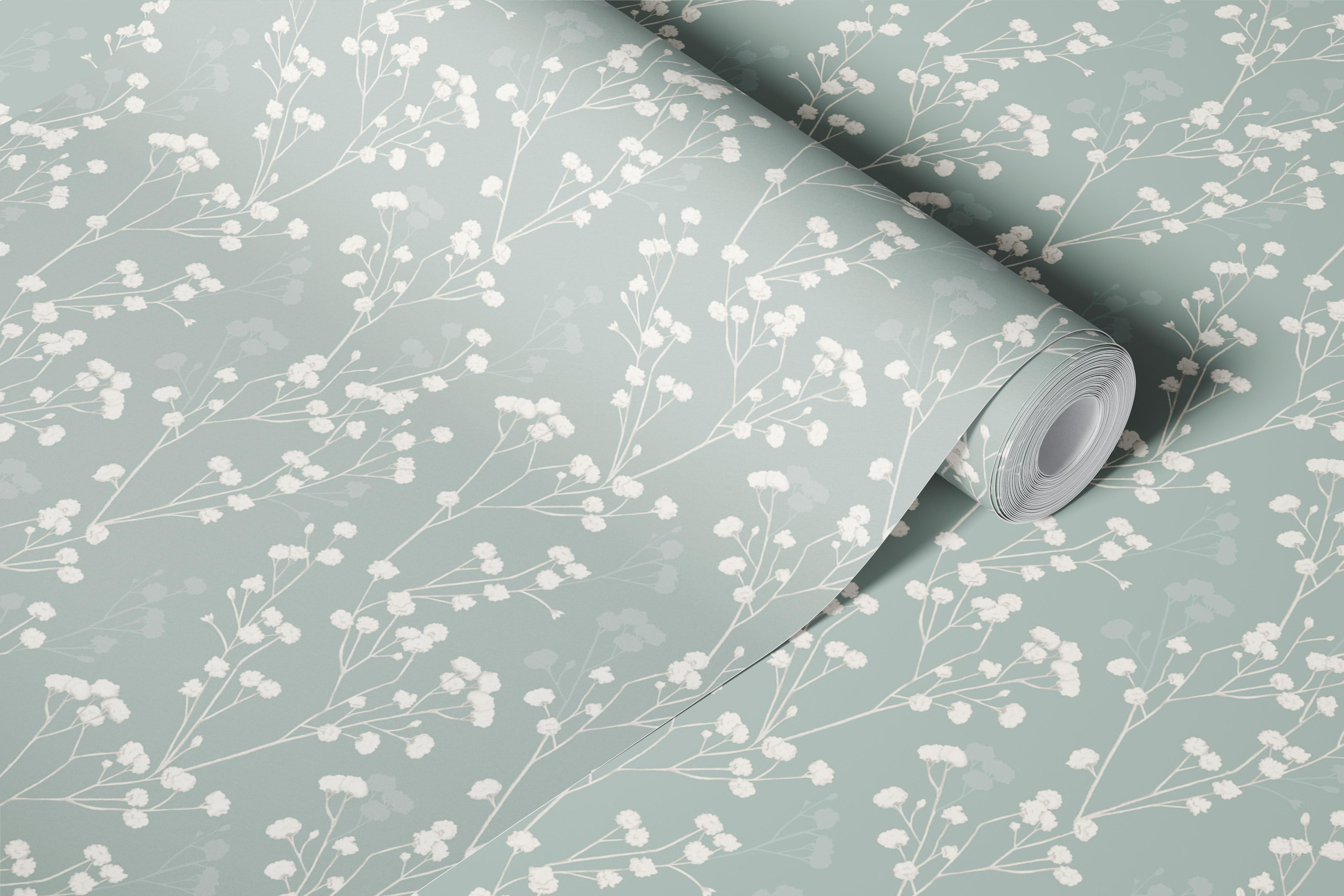Delicate white floral pattern on grey green wallpaper