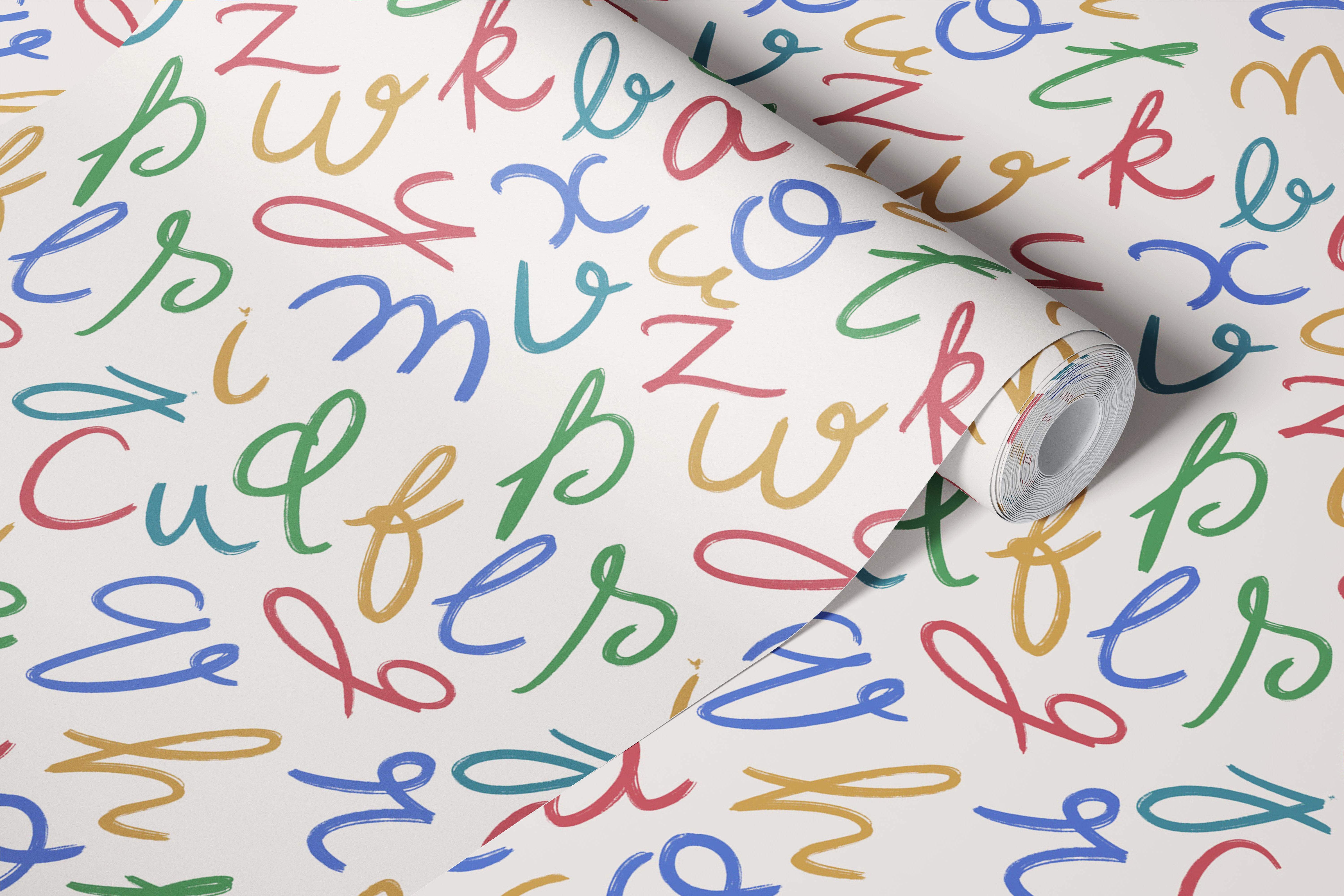 Colorful cursive alphabets wallpaper in a room.