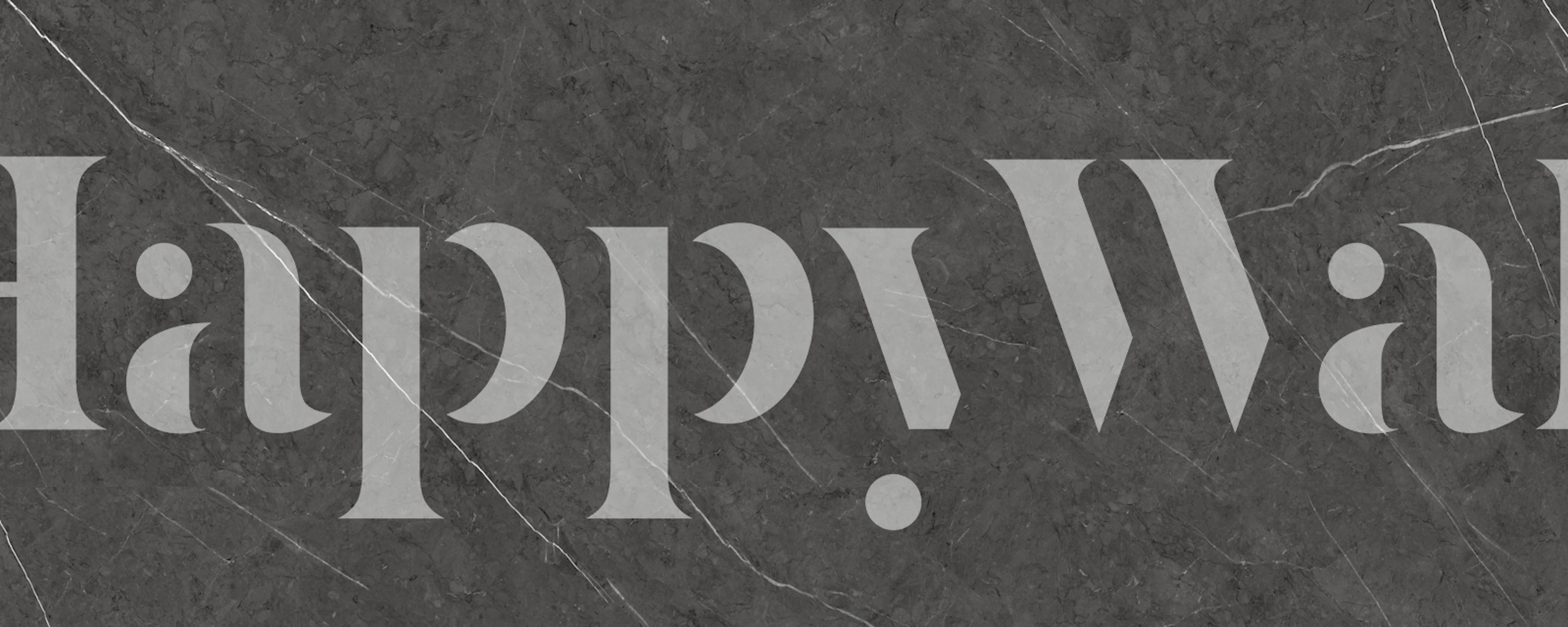 Black marble wallpaper with white veining pattern showing contemporary design.