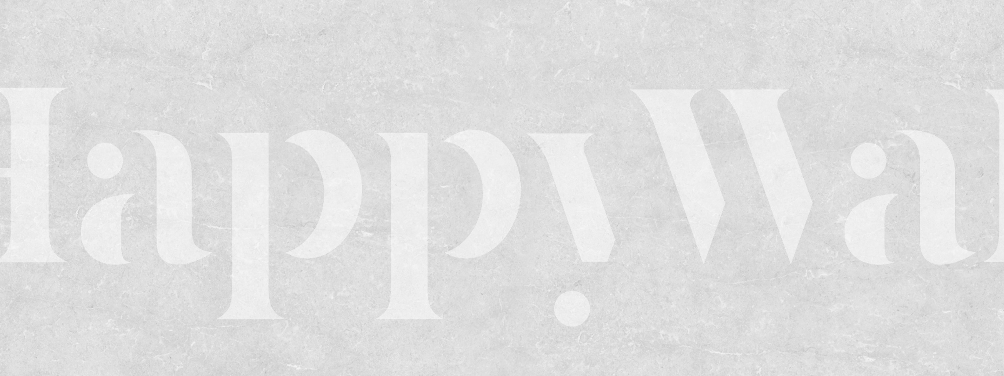 Soft Italian limestone effect in light gray wallpaper