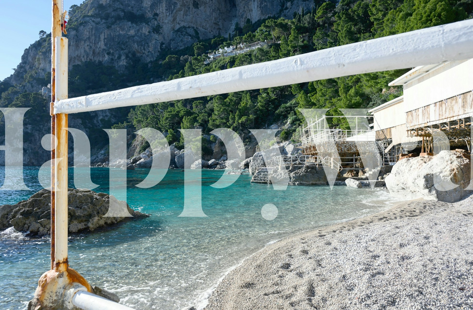 Coastal beach scene with aqua and green colors wallpaper