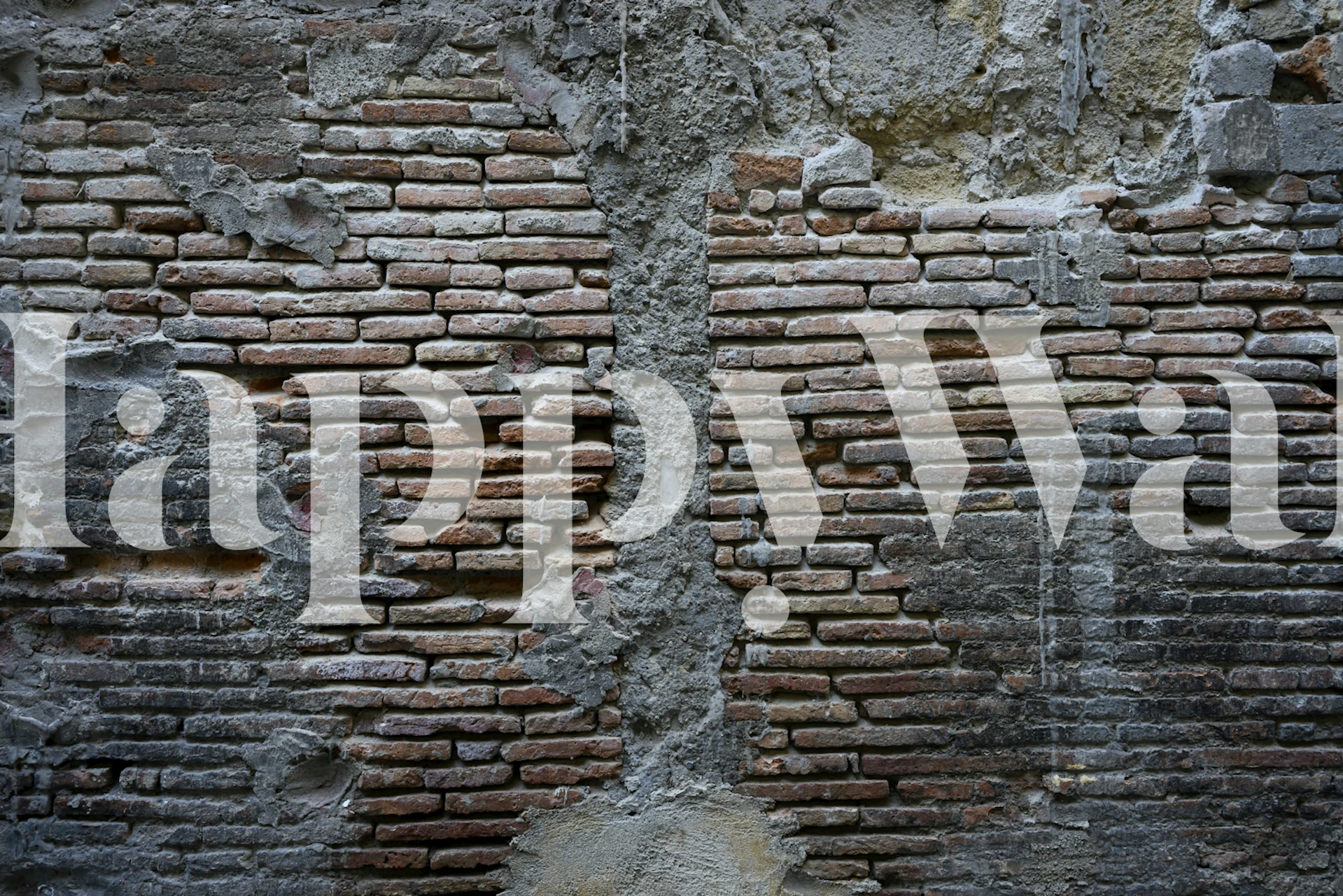 Rustic brick wall with weathered texture and gray tones wallpaper