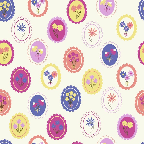 Colourful flowers in oval frames on ivory