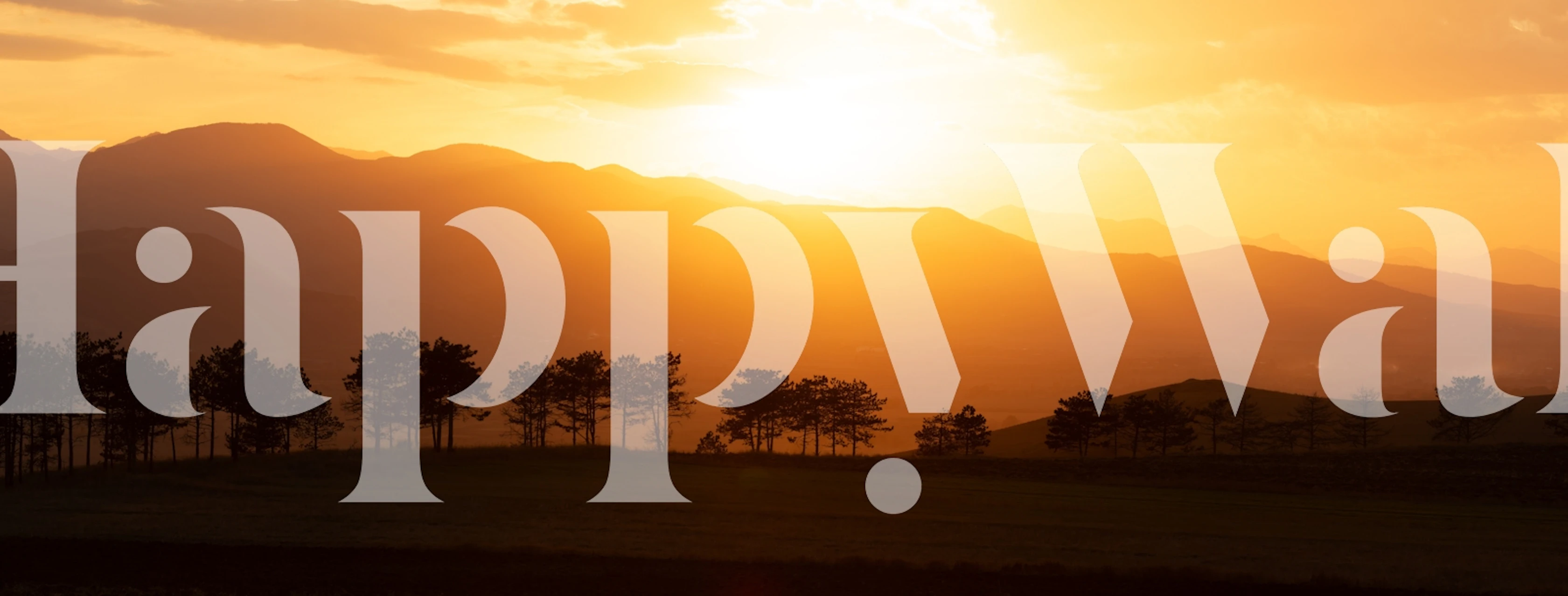 Wallpaper featuring hills in golden light