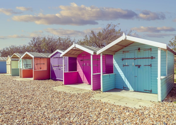 Pastel Seaside Cabins in a Row