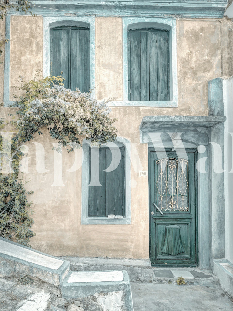 Teal windows on a coastal cottage