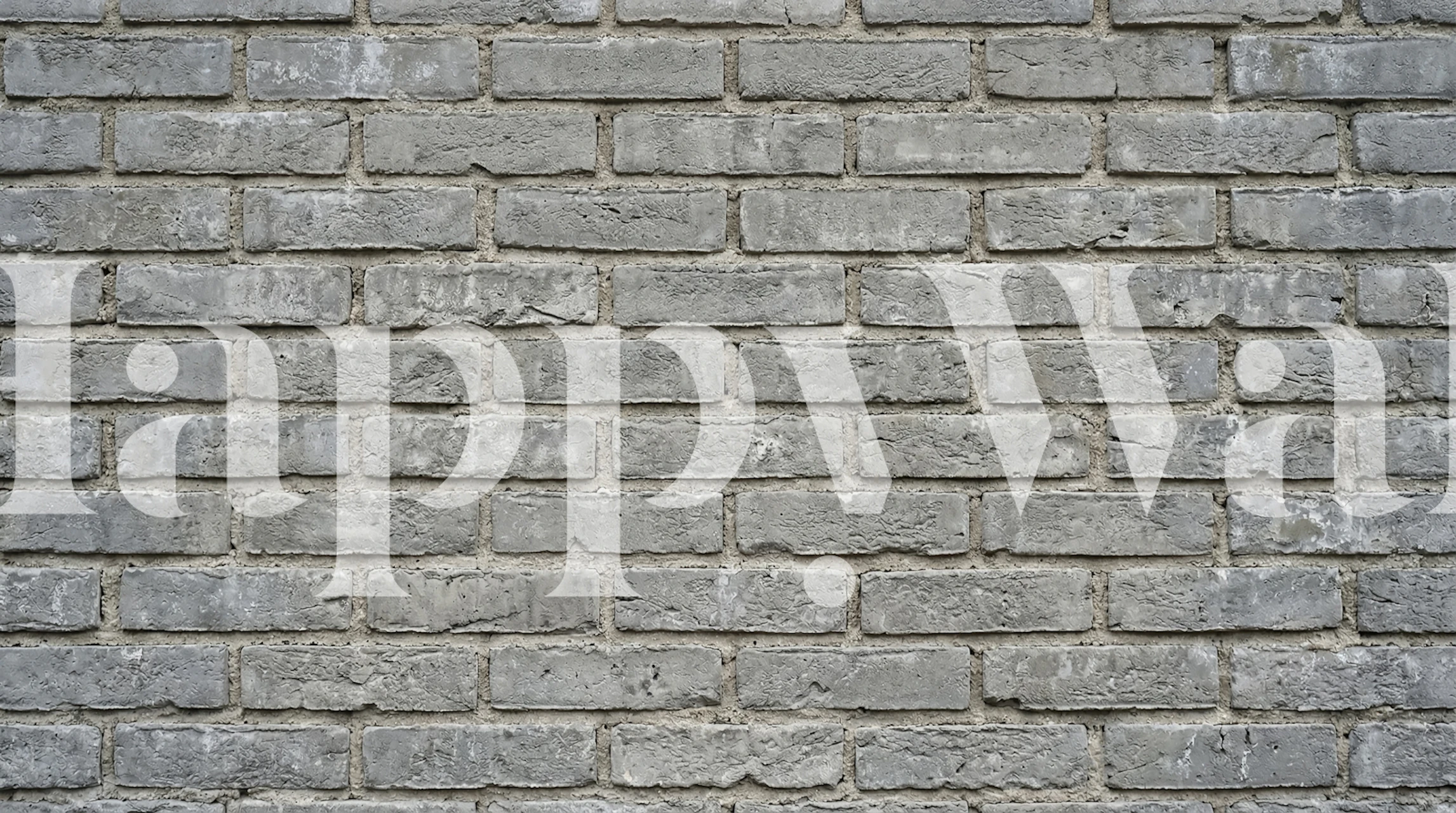 Urban gray brick texture wallpaper in a room