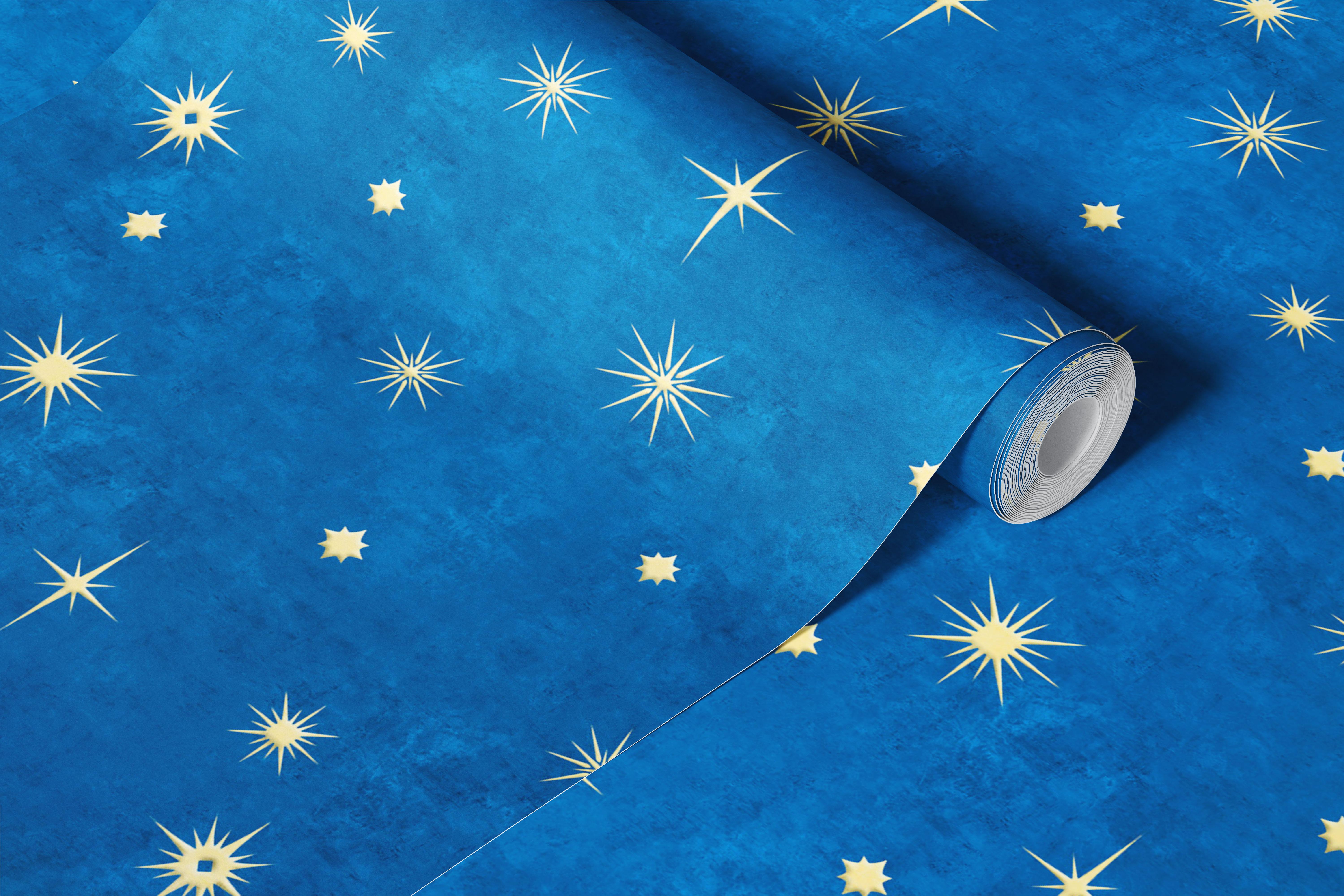 Golden stars pattern on deep blue wallpaper