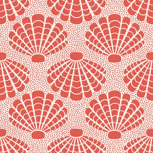 Coral red seashells on sand