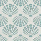 Silver teal seashells on sand