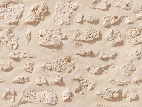 Sunlit Limestone Wall Texture
