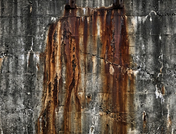 Rust Streaked Concrete Wall