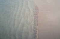 Serene Sea Meets Sandy Beach 2 tapet
