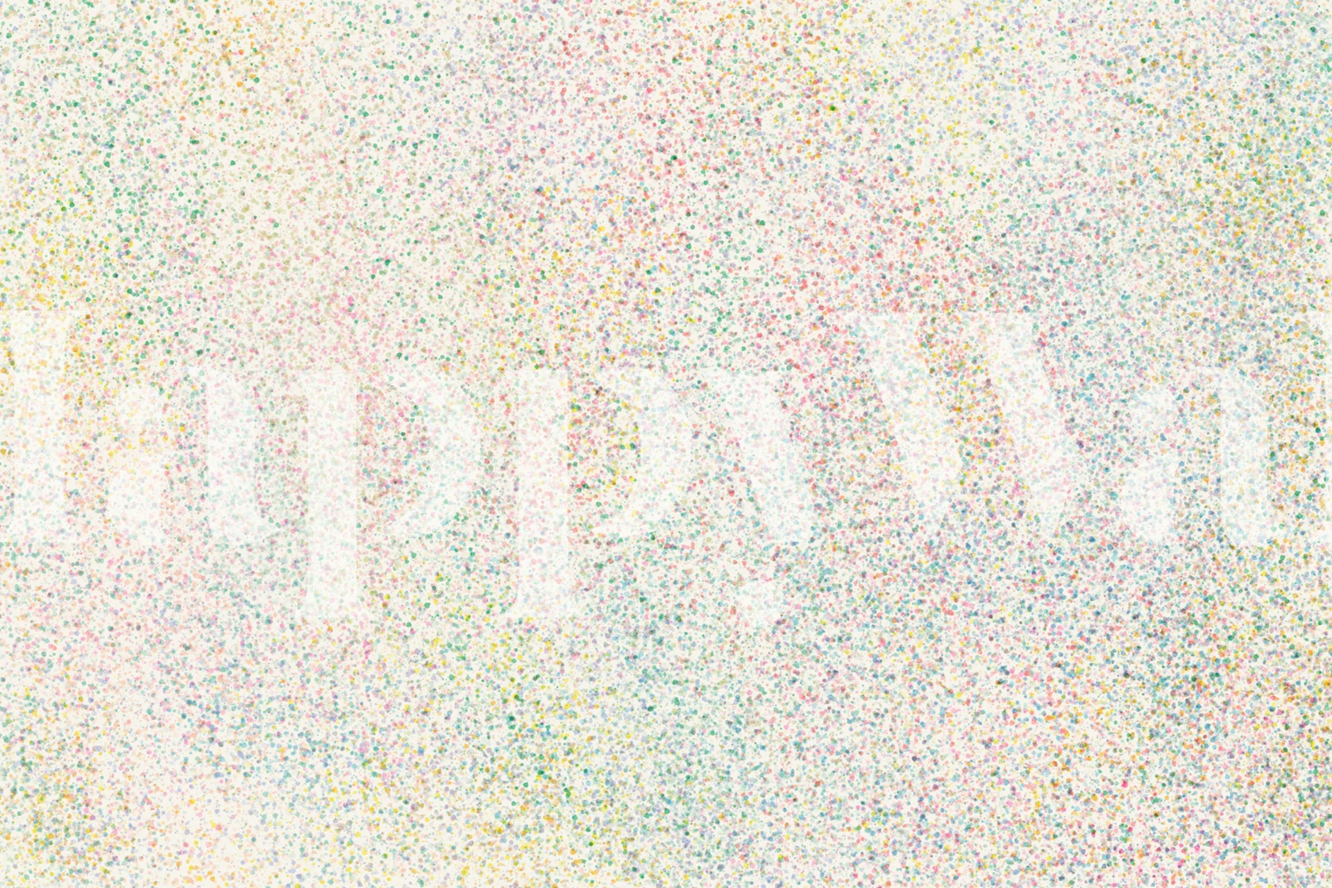 Playful rainbow sprinkle scatter wallpaper in a room