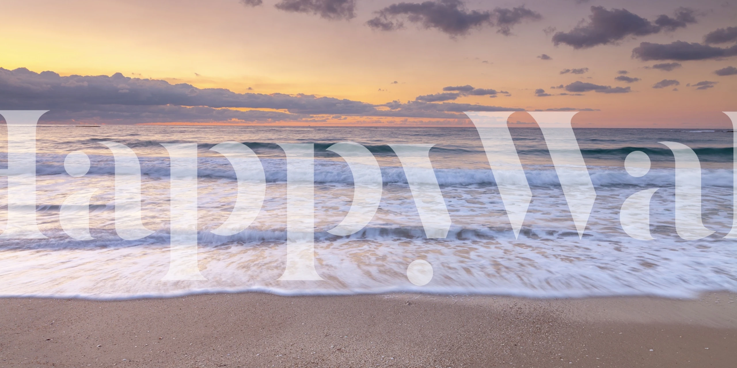 Pastel ocean sunset wallpaper in a bedroom