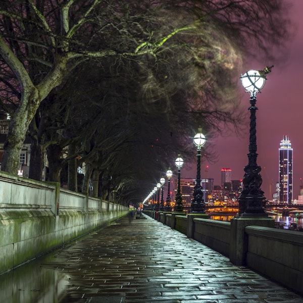Misty Riverside Promenade at Night