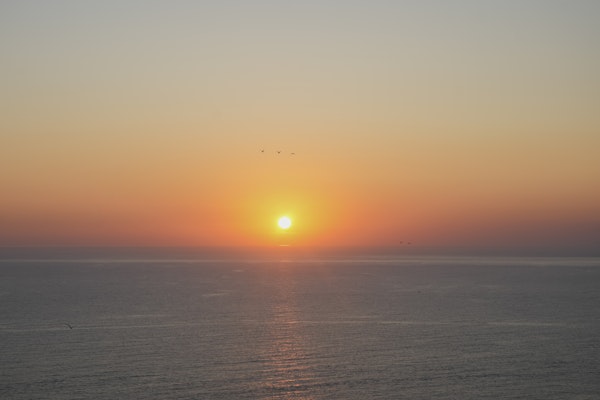 Golden Sunset Over Calm Sea