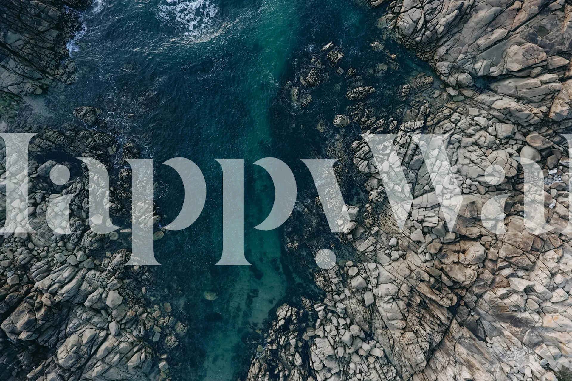 Aerial view ocean and rocky coastline wall mural