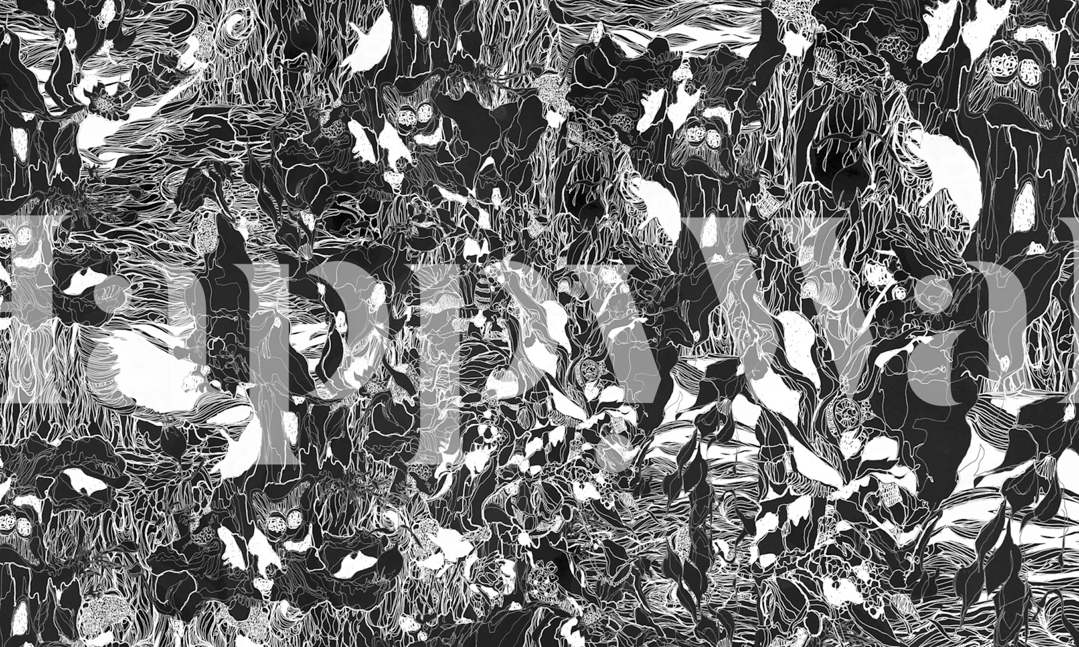 Black and white botanical wallpaper in a room