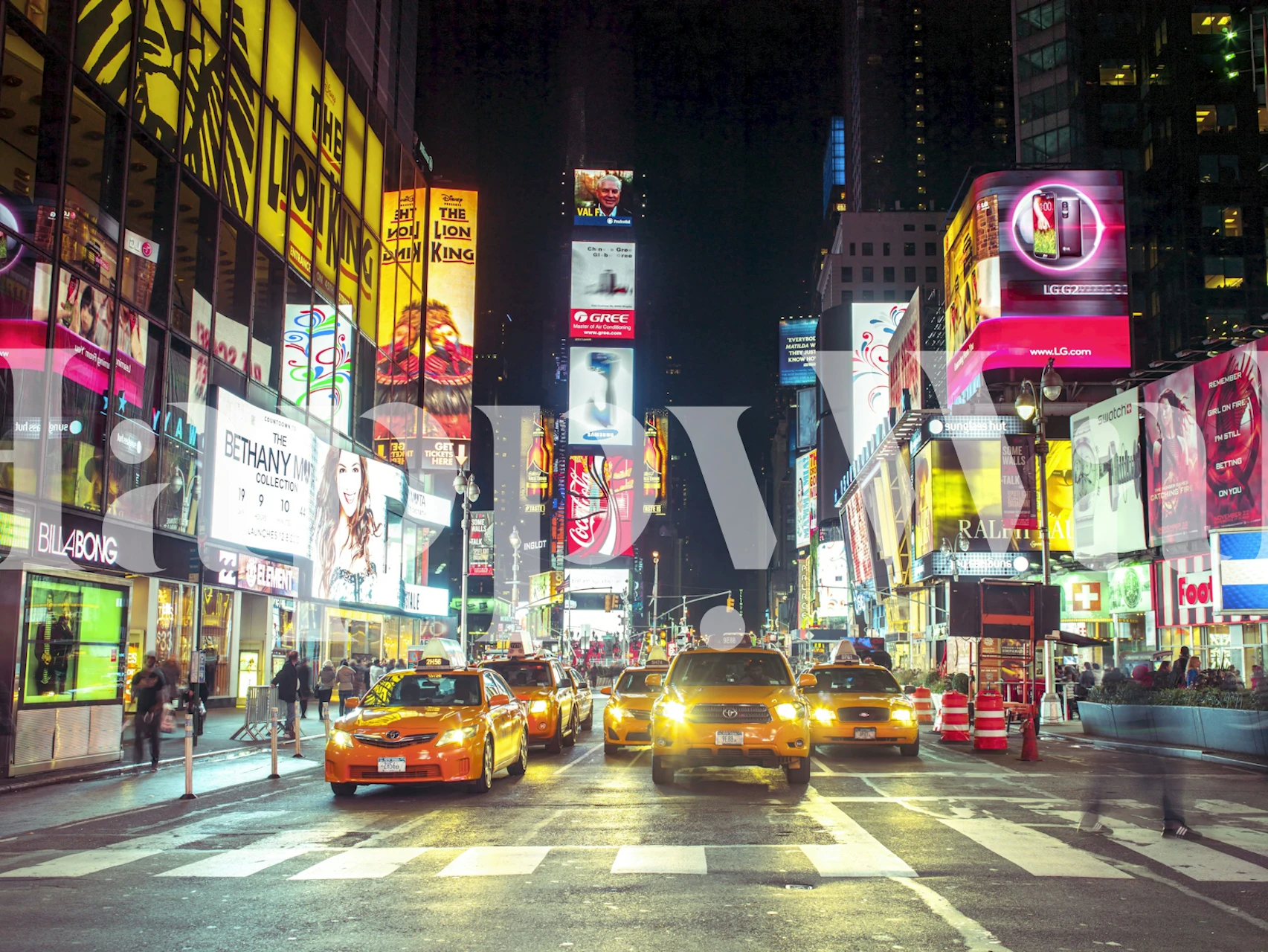 Times Square night wallpaper in a modern room