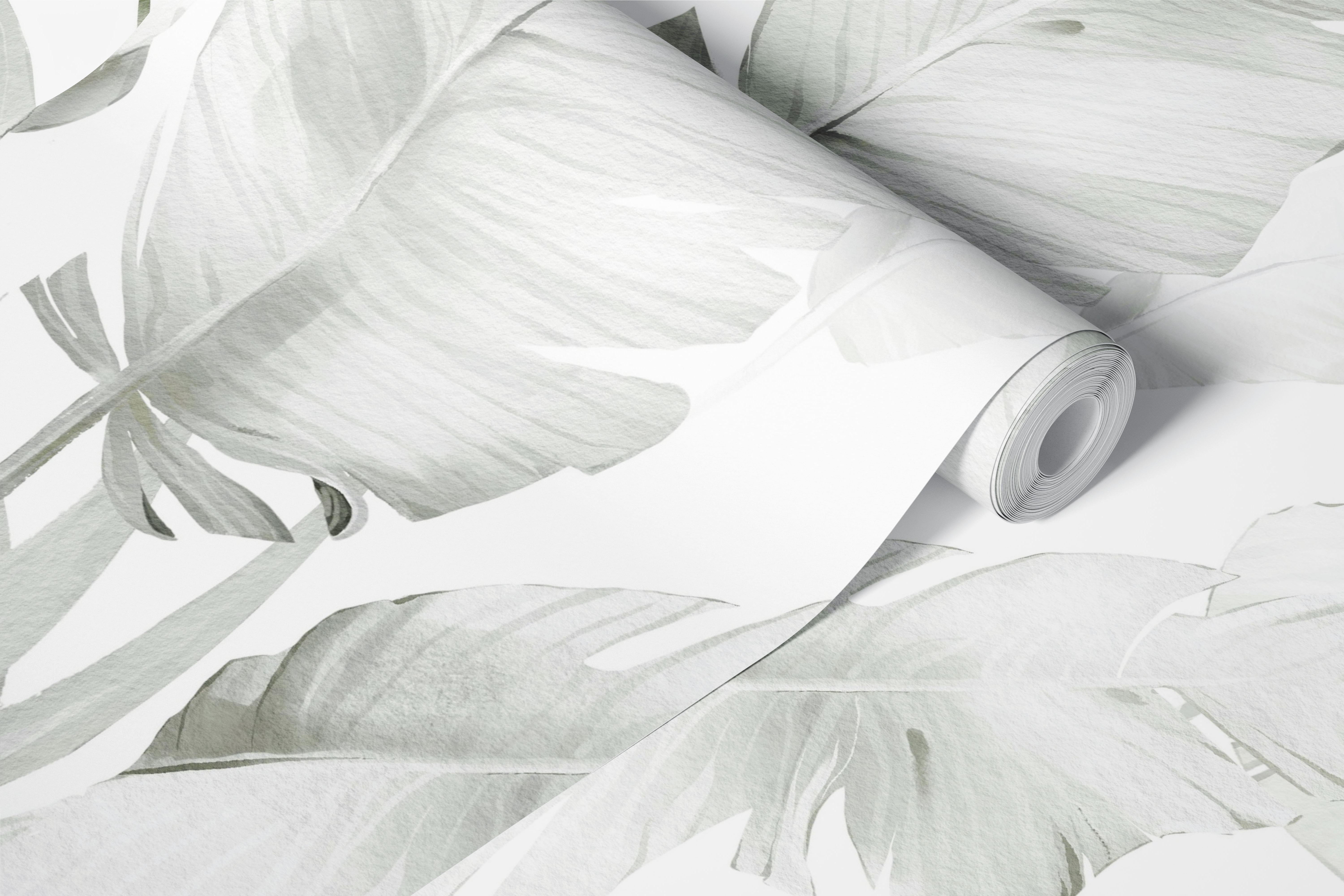 Papel de parede cinzento com folhas tropicais num quarto moderno