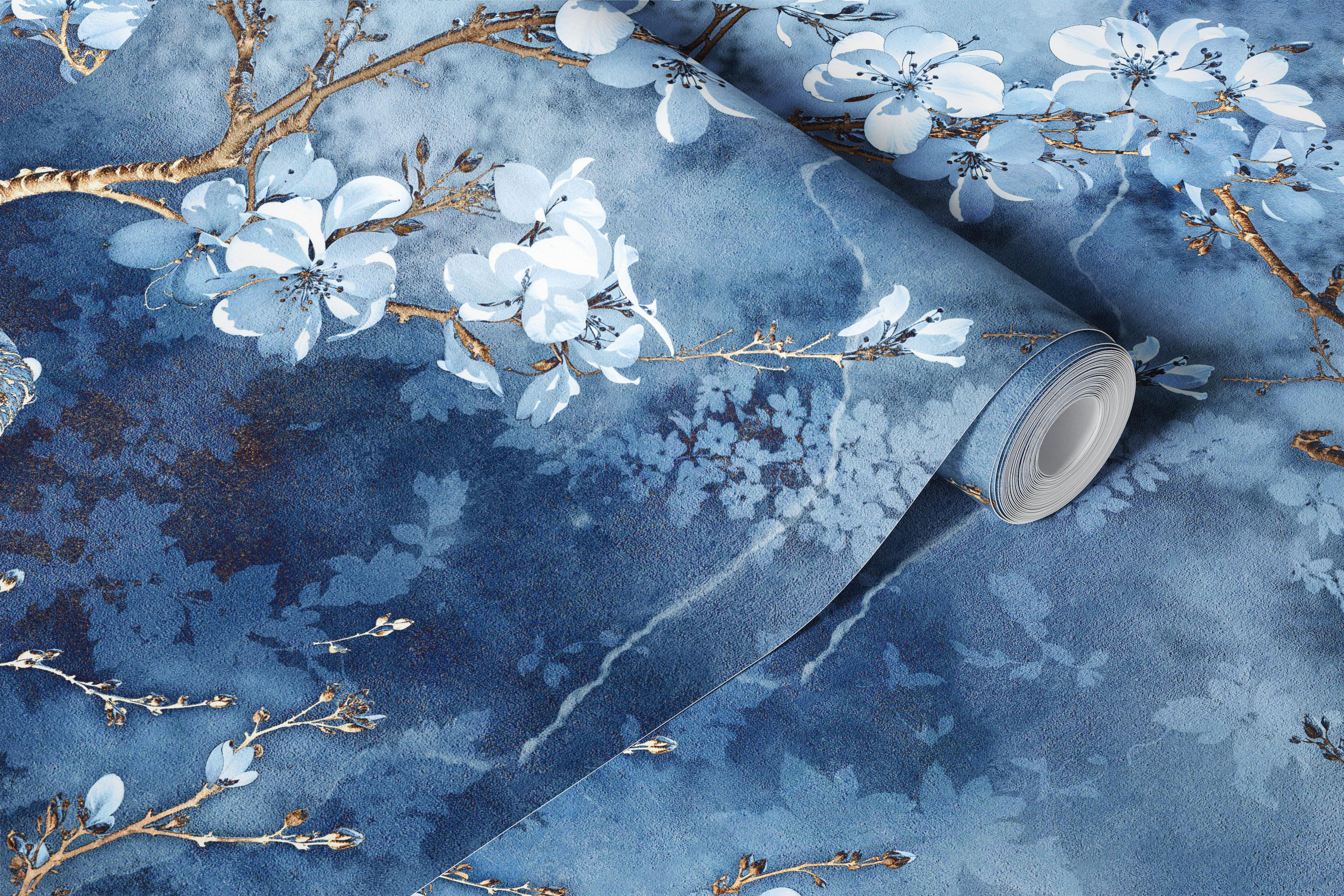 White sakura branch wallpaper in a blue room