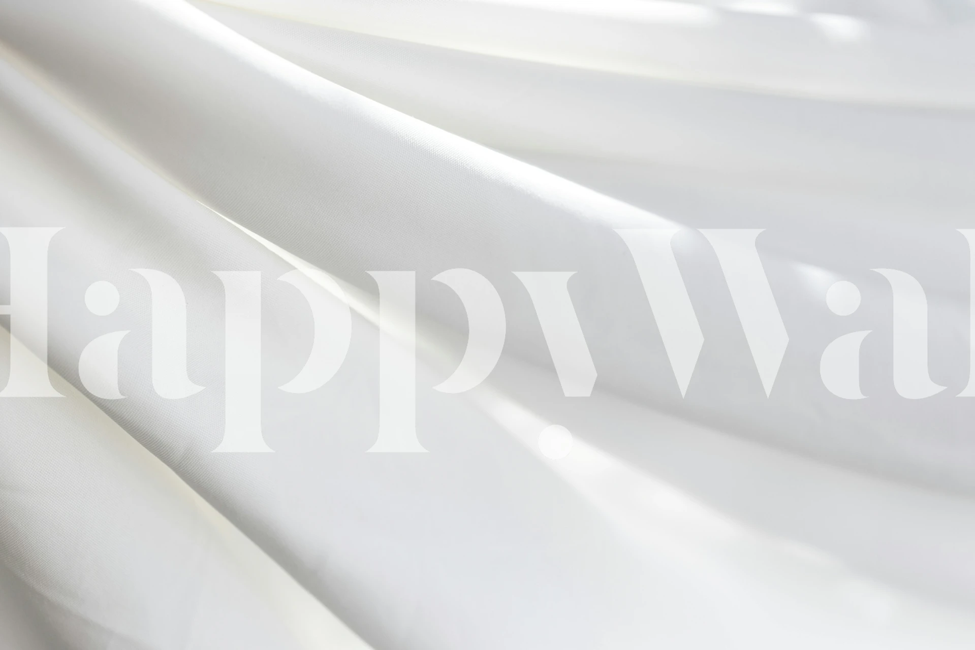 Soft white fabric folds wallpaper in a light room