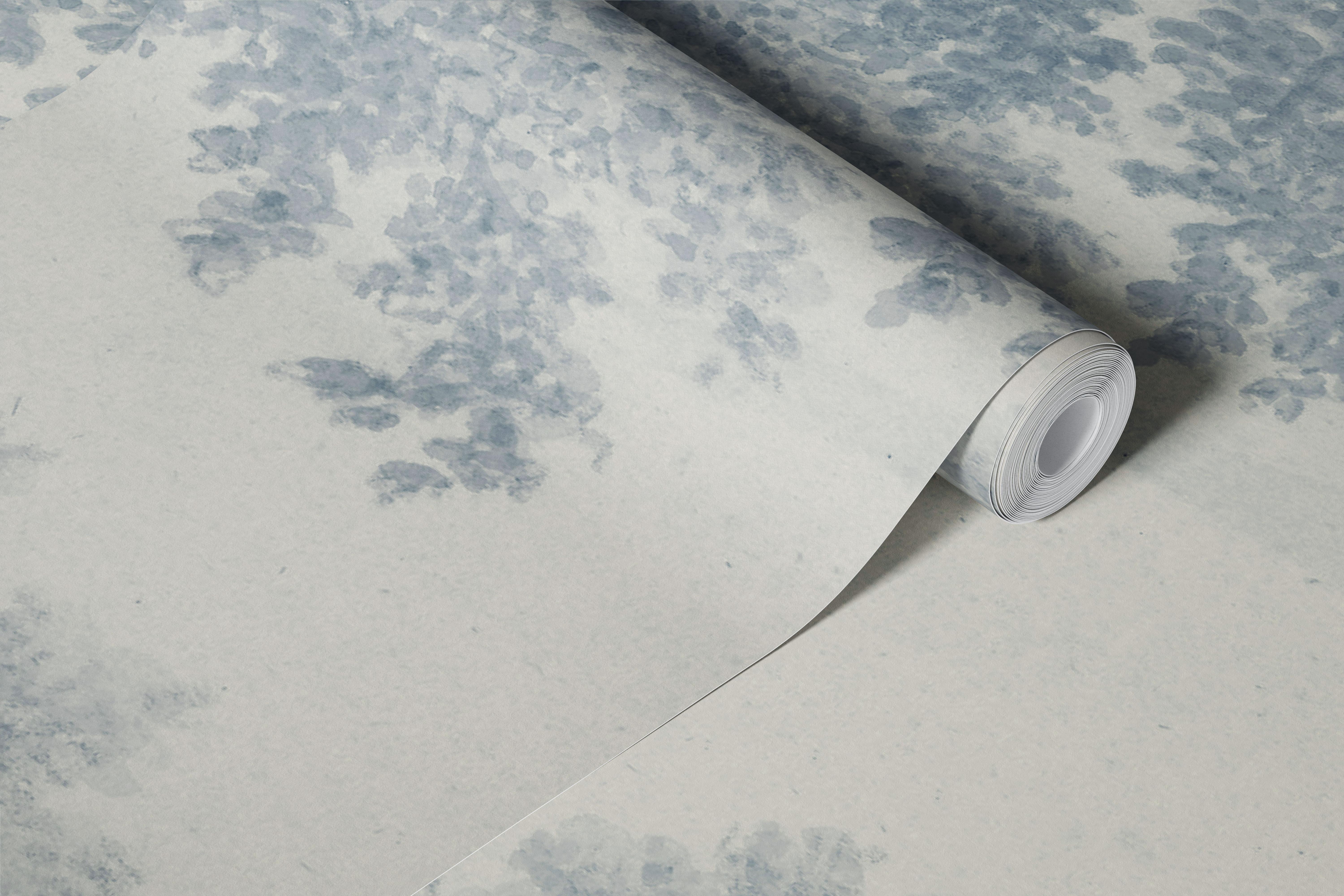 Blue leafy forest wallpaper in a room