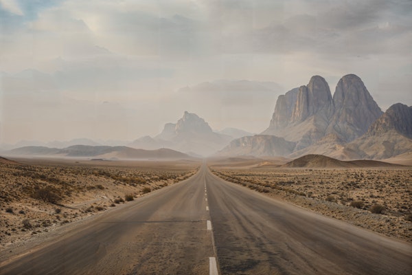 Warm beige desert road mountains