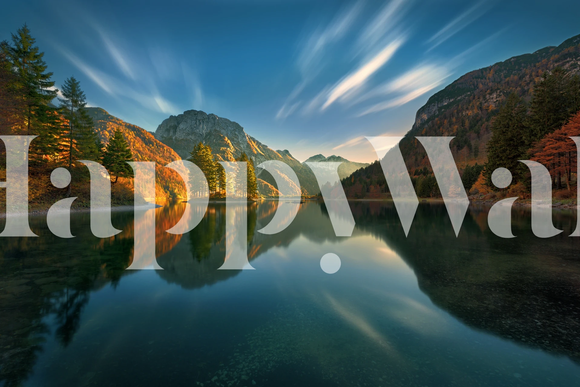 Scenic mountain lake with trees reflecting in water, blue and green tones, nature wallpaper