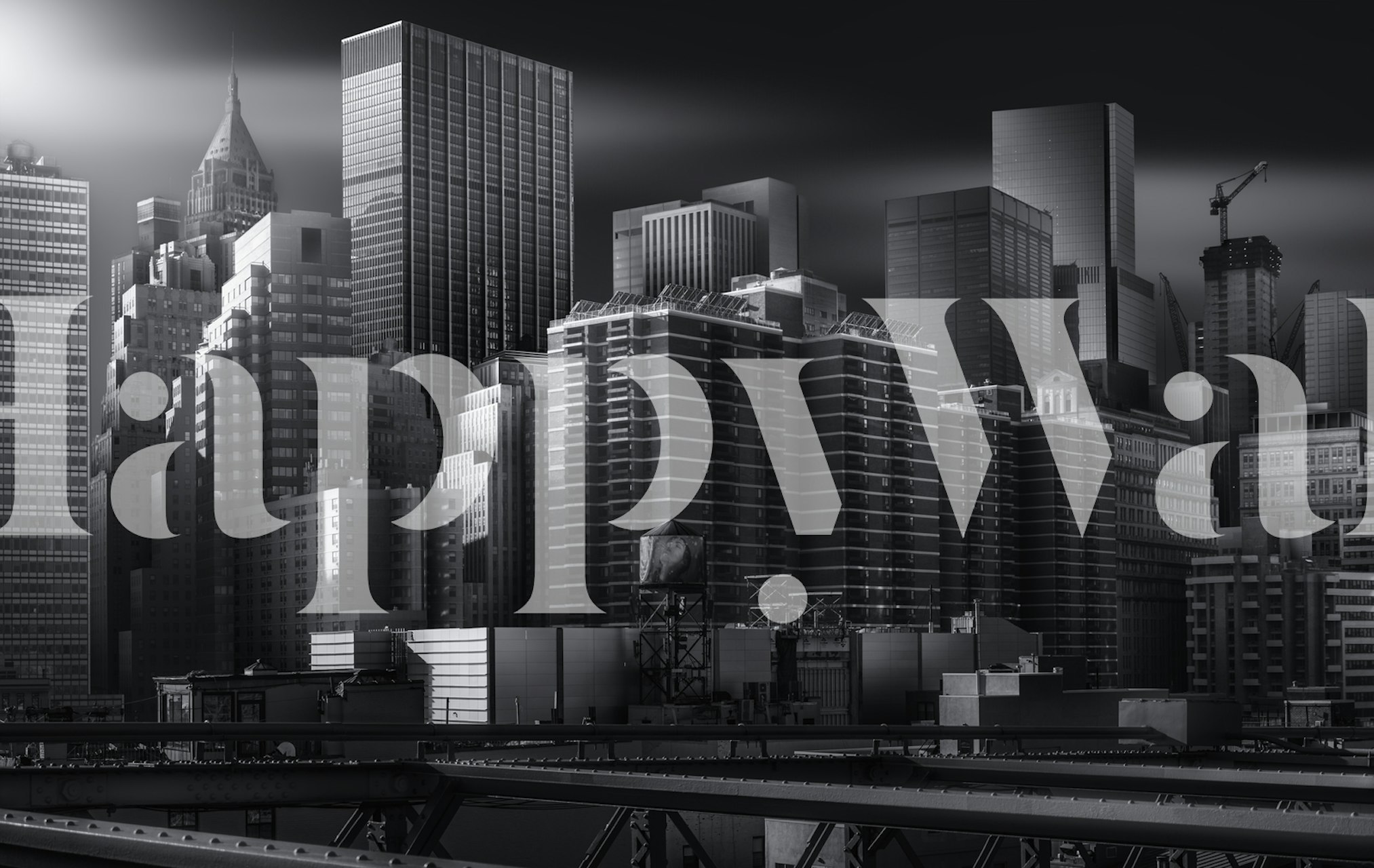 Monochrome cityscape wall mural with skyscrapers fading into mist