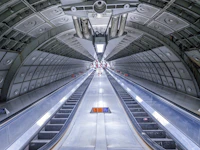 Cool gray underground escalator view tapetit