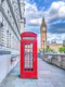 Crimson Red Phone Booth Cityscape