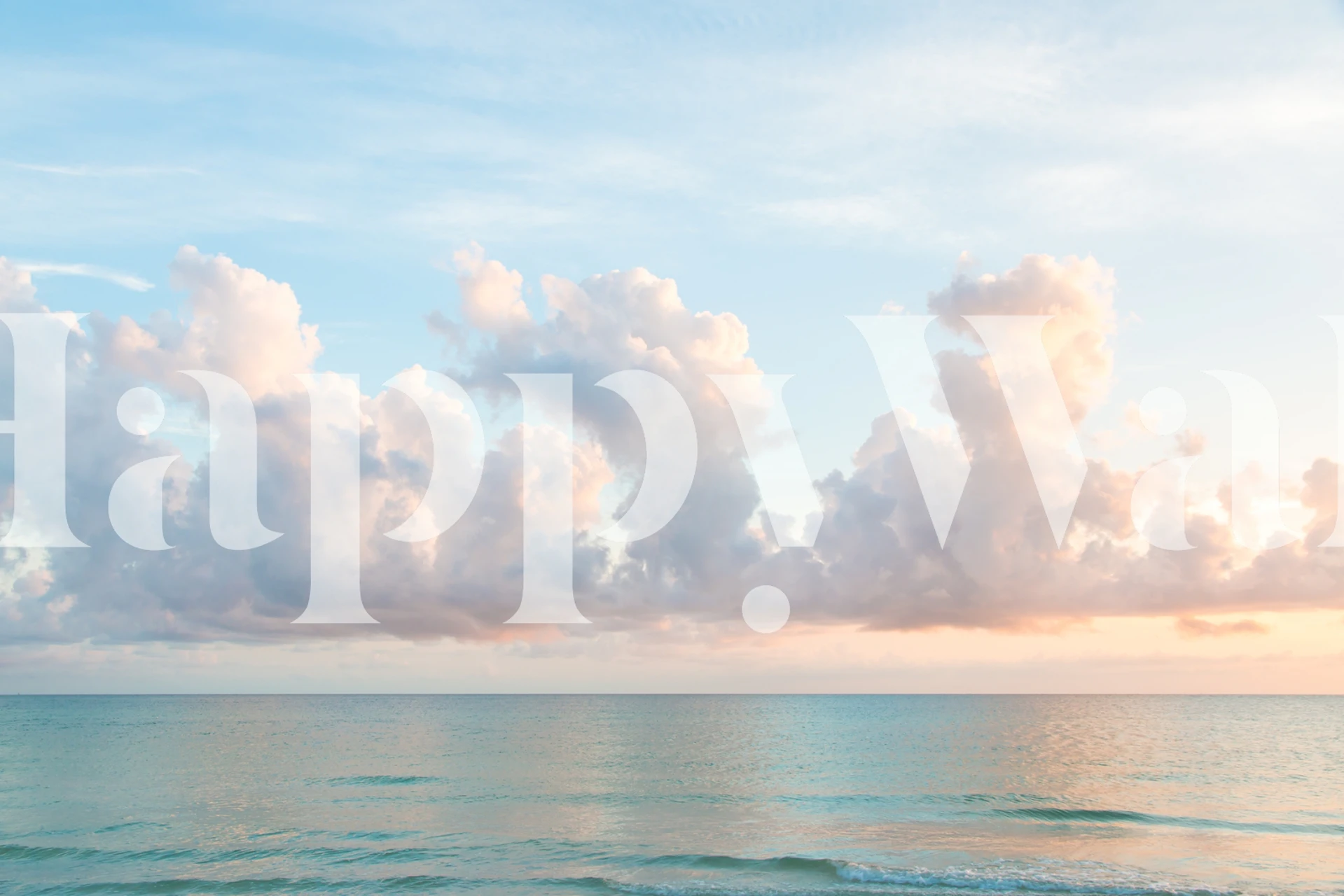 Blue ocean with gentle waves and soft pink clouds wallpaper