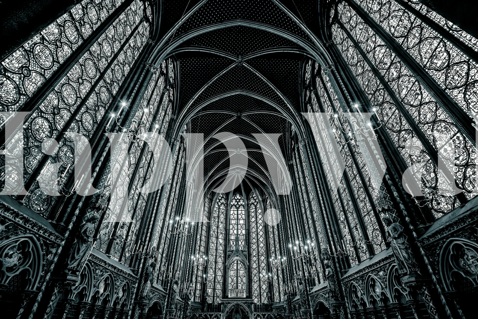 Gothic cathedral interior with intricate stained glass and arches wallpaper